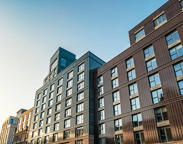 Modern student accommodation buildings at sunset